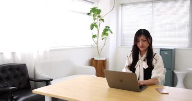 Tokyo Japan 06.19.2022. This working scene is acted by Japanese model in the office. High quality 4k footage