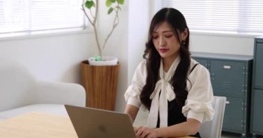Tokyo Japan 06.19.2022. This working scene is acted by Japanese model in the office. High quality 4k footage