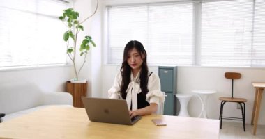 Tokyo Japan 06.19.2022. This working scene is acted by Japanese model in the office. High quality 4k footage
