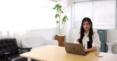 Tokyo Japan 06.19.2022. This working scene is acted by Japanese model in the office. High quality 4k footage