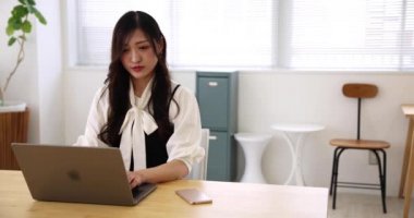 Tokyo Japan 06.19.2022. This working scene is acted by Japanese model in the office. High quality 4k footage