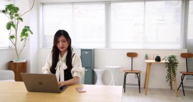 Tokyo Japan 06.19.2022. This working scene is acted by Japanese model in the office. High quality 4k footage