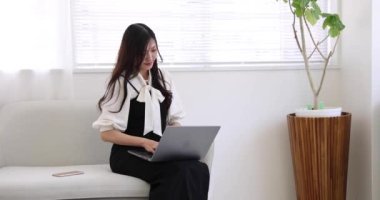 Tokyo Japan 06.19.2022. This working scene is acted by Japanese model in the office. High quality 4k footage