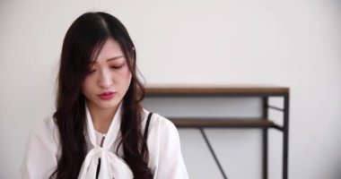 Tokyo Japan 06.19.2022. This working scene is acted by Japanese model in the office. High quality 4k footage