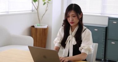 Tokyo Japan 06.19.2022. This working scene is acted by Japanese model in the office. High quality 4k footage