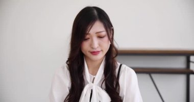 Tokyo Japan 06.19.2022. This working scene is acted by Japanese model in the office. High quality 4k footage