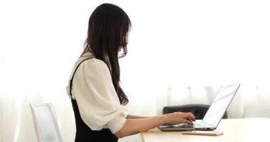 Tokyo Japan 06.19.2022. This working scene is acted by Japanese model in the office. High quality 4k footage