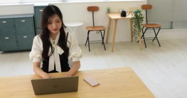 Tokyo Japan 06.19.2022. This working scene is acted by Japanese model in the office. High quality 4k footage