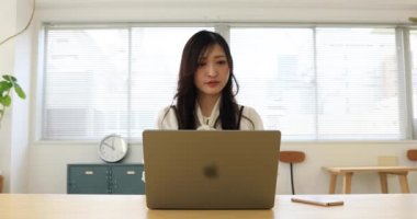 Tokyo Japan 06.19.2022. This working scene is acted by Japanese model in the office. High quality 4k footage