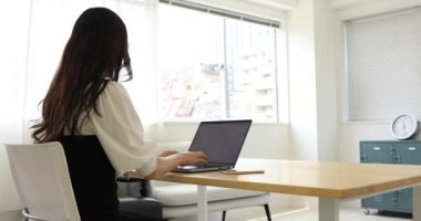 Tokyo Japan 06.19.2022. This working scene is acted by Japanese model in the office. High quality 4k footage