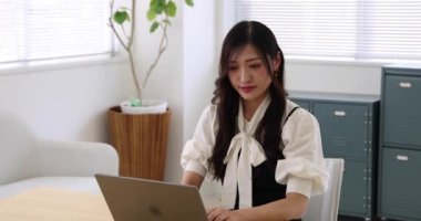 Tokyo Japan 06.19.2022. This working scene is acted by Japanese model in the office. High quality 4k footage