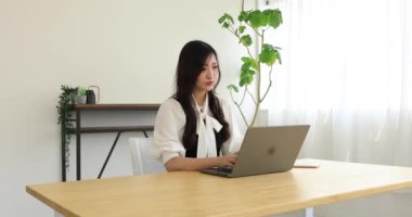 Tokyo Japan 06.19.2022. This working scene is acted by Japanese model in the office. High quality 4k footage