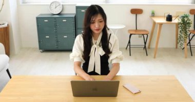 Tokyo Japan 06.19.2022. This working scene is acted by Japanese model in the office. High quality 4k footage