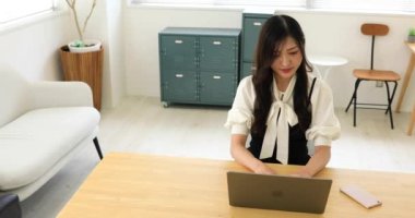 Tokyo Japan 06.19.2022. This working scene is acted by Japanese model in the office. High quality 4k footage