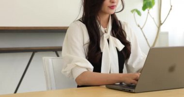 Tokyo Japan 06.19.2022. This working scene is acted by Japanese model in the office. High quality 4k footage