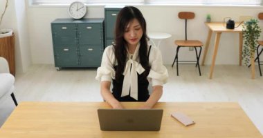 Tokyo Japan 06.19.2022. This working scene is acted by Japanese model in the office. High quality 4k footage