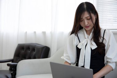 Tokyo Japan 06.19.2022. This working scene is acted by Japanese model in the office. High quality photography