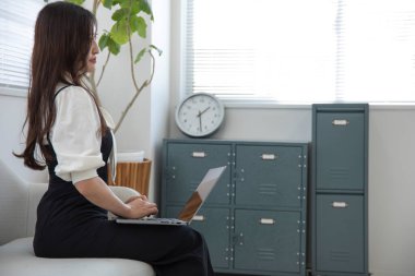 Tokyo Japan 06.19.2022. This working scene is acted by Japanese model in the office. High quality photography