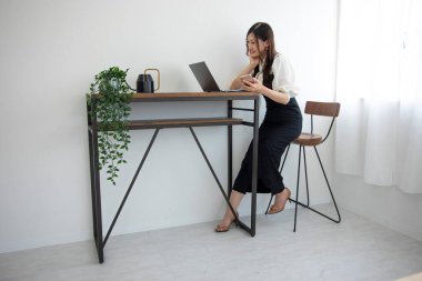 Tokyo Japan 06.19.2022. This working scene is acted by Japanese model in the office. 