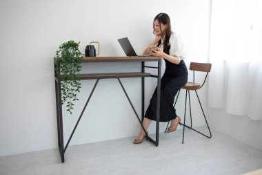 Tokyo Japan 06.19.2022. This working scene is acted by Japanese model in the office. 