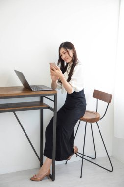 Tokyo Japan 06.19.2022. This working scene is acted by Japanese model in the office. High quality photography