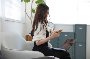 Tokyo Japan 06.19.2022. This working scene is acted by Japanese model in the office. High quality photography