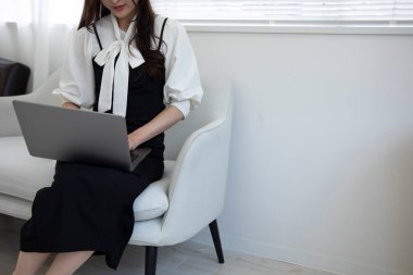 Tokyo Japan 06.19.2022. This working scene is acted by Japanese model in the office. High quality photography