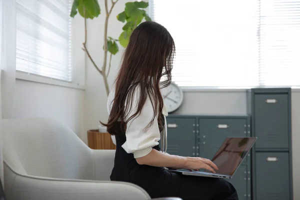 Tokyo Japan 06.19.2022. This working scene is acted by Japanese model in the office. High quality photography