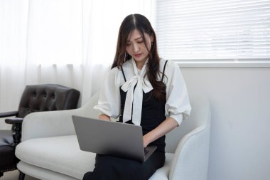 Tokyo Japan 06.19.2022. This working scene is acted by Japanese model in the office. High quality photography