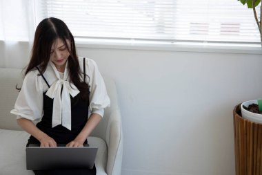 Tokyo Japan 06.19.2022. This working scene is acted by Japanese model in the office. High quality photography