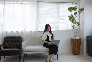 Tokyo Japan 06.19.2022. This working scene is acted by Japanese model in the office. High quality photography