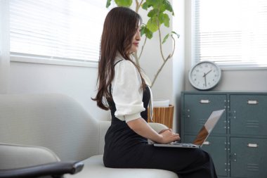 Tokyo Japan 06.19.2022. This working scene is acted by Japanese model in the office. High quality photography