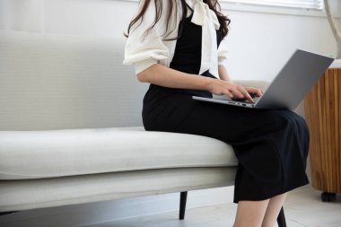 Tokyo Japan 06.19.2022. This working scene is acted by Japanese model in the office. High quality photography