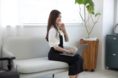 Tokyo Japan 06.19.2022. This working scene is acted by Japanese model in the office. High quality photography