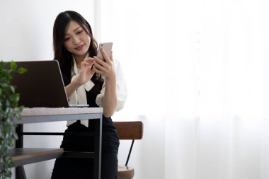 Tokyo Japan 06.19.2022. This working scene is acted by Japanese model in the office. 