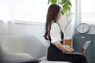 Tokyo Japan 06.19.2022. This working scene is acted by Japanese model in the office. High quality photography