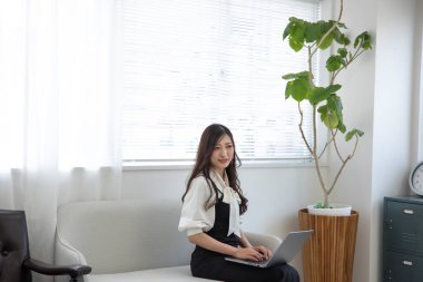 Tokyo Japan 06.19.2022. This working scene is acted by Japanese model in the office. High quality photography