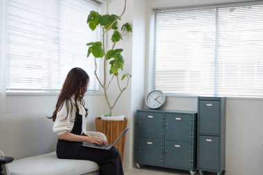 Tokyo Japan 06.19.2022. This working scene is acted by Japanese model in the office. High quality photography