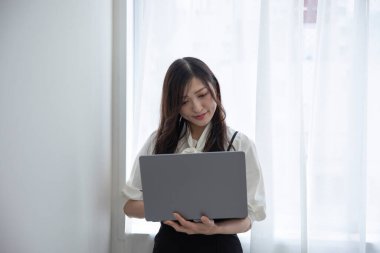 Tokyo Japan 06.19.2022. This working scene is acted by Japanese model in the office. High quality photography