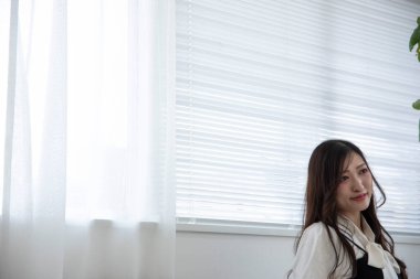 Tokyo Japan 06.19.2022. This working scene is acted by Japanese model in the office. High quality photography