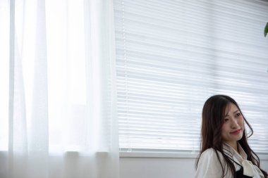 Tokyo Japan 06.19.2022. This working scene is acted by Japanese model in the office. High quality photography
