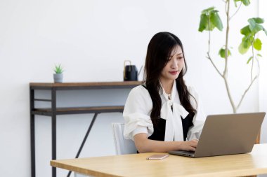 Tokyo Japan 06.19.2022. This working scene is acted by Japanese model in the office. High quality photography