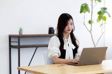 Tokyo Japan 06.19.2022. This working scene is acted by Japanese model in the office. High quality photography