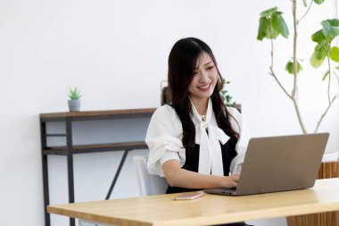 Tokyo Japan 06.19.2022. This working scene is acted by Japanese model in the office. High quality photography