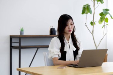 Tokyo Japan 06.19.2022. This working scene is acted by Japanese model in the office. High quality photography