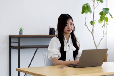 Tokyo Japan 06.19.2022. This working scene is acted by Japanese model in the office. High quality photography