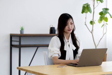 Tokyo Japan 06.19.2022. This working scene is acted by Japanese model in the office. High quality photography