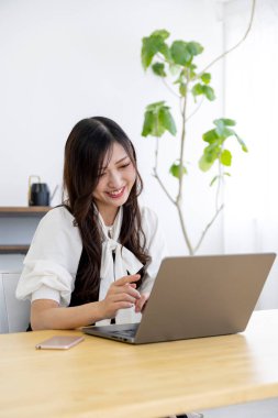 Tokyo Japan 06.19.2022. This working scene is acted by Japanese model in the office. High quality photography