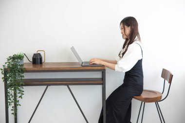 Tokyo Japan 06.19.2022. This working scene is acted by Japanese model in the office. High quality photography