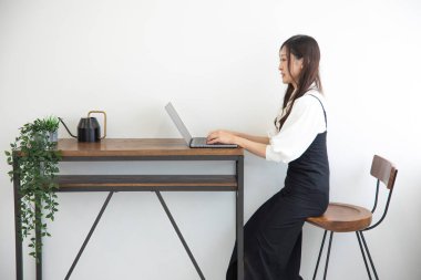 Tokyo Japan 06.19.2022. This working scene is acted by Japanese model in the office. High quality photography